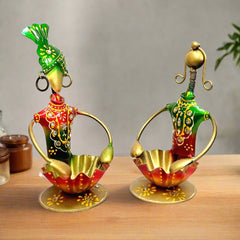 A romantic couple figurine candle holder, a perfect gift for an anniversary or Valentine's Day.