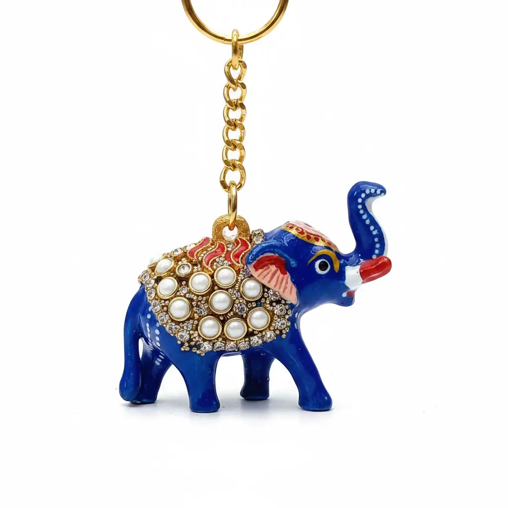 Royal blue elephant keychain with pearl-style detailing