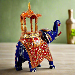 Royal metal Ambabari elephant with meenakari hand painting in beautiful blue, red, and orange hues.