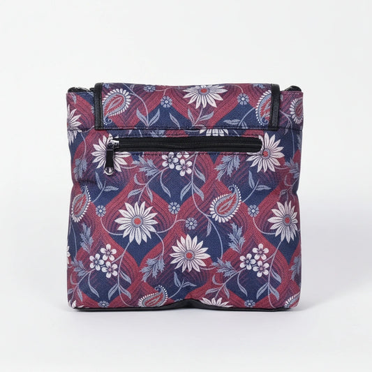 Rear view of the floral sling bag highlighting the secure back side zipper pocket