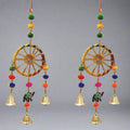 A set of two decorative wall hanging torans, with vibrant colors and designs.