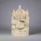 Handcrafted Sevan wood Ganesh statue with intricate details, radiating positive energy and spiritual blessings