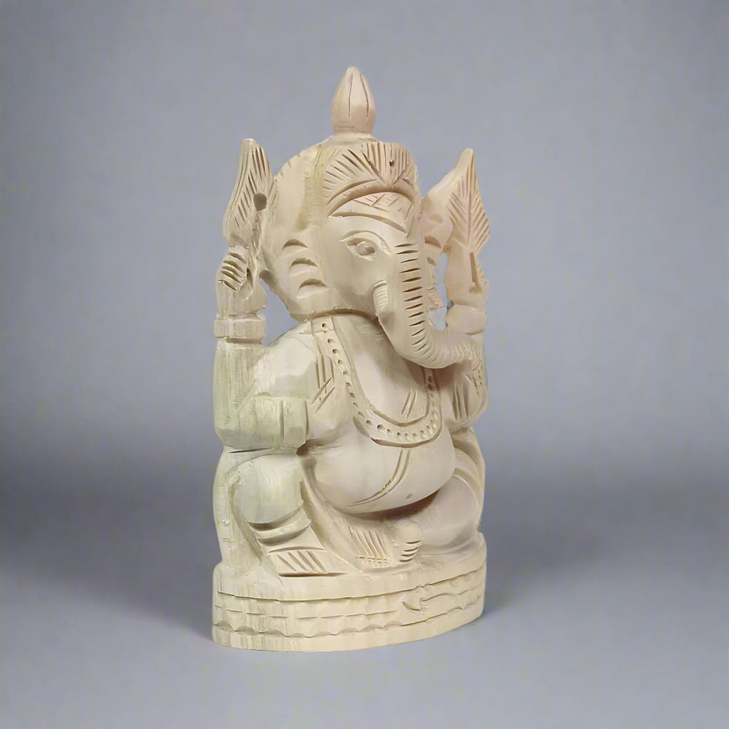 Sevan wood Ganesh statue by KK Gift Store, symbolizing prosperity, protection, and divine connection