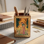 Sheesham wood pen holder with a brass border framing a Rajasthani gemstone painting of a woman with deer, shown from the front.