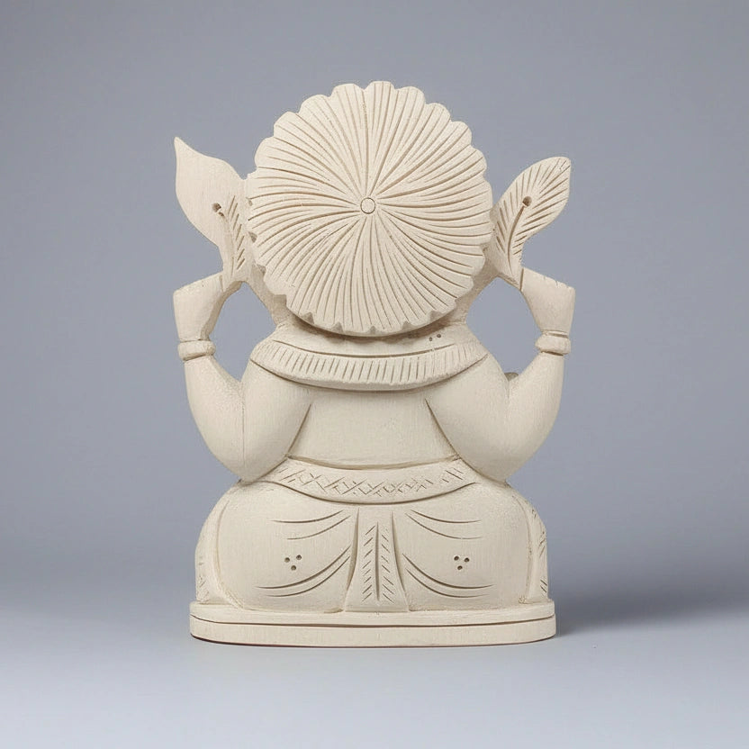 Shriparni Sevan wood Ganesh statue placed in a traditional Indian home temple for Vaastu benefits.