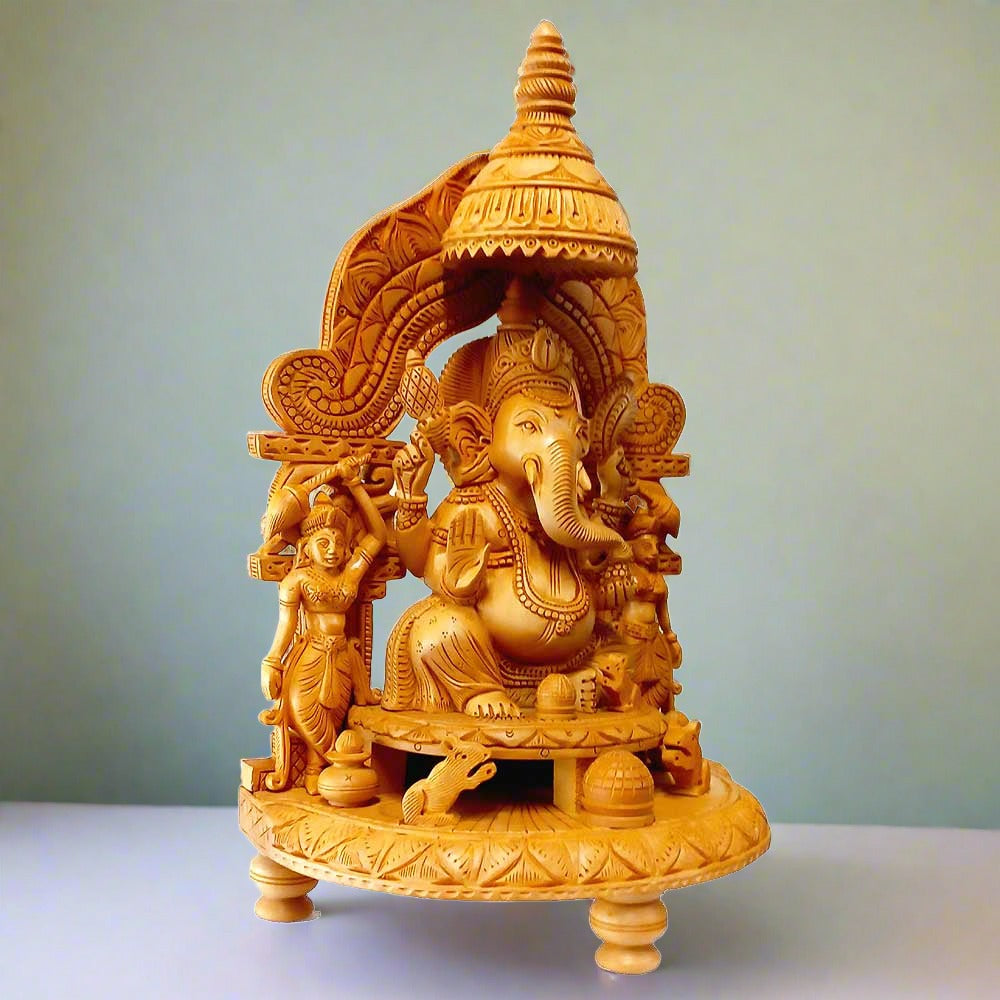 A sitting Ganesha with Riddhi Siddhi showpiece, a perfect gift for any auspicious occasion.
