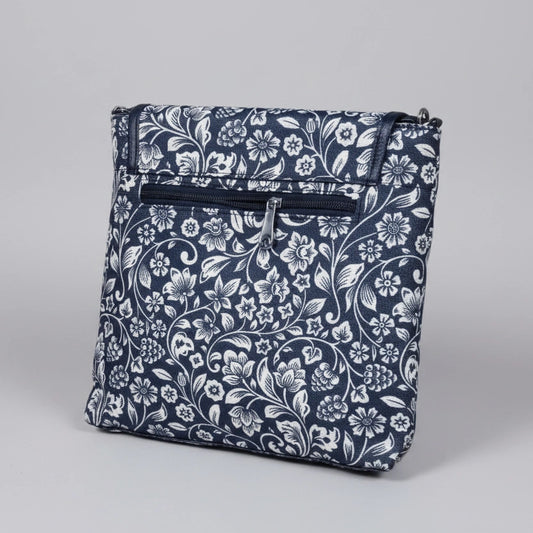 Rear view of the floral bag highlighting the secure back exterior zipper pocket for valuables
