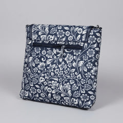Rear view of the floral bag highlighting the secure back exterior zipper pocket for valuables