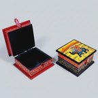 Top-down view of a 10 cm by 10 cm by 6 cm wooden painted jewellery box showing its compact square dimensions.