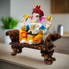 Hand-painted Ganesha idol with a creative twist, symbolizing joy and peace, perfect for home or office decor.