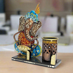 A sturdy metal pen holder with a card slot, featuring a beautiful Ganesha design.