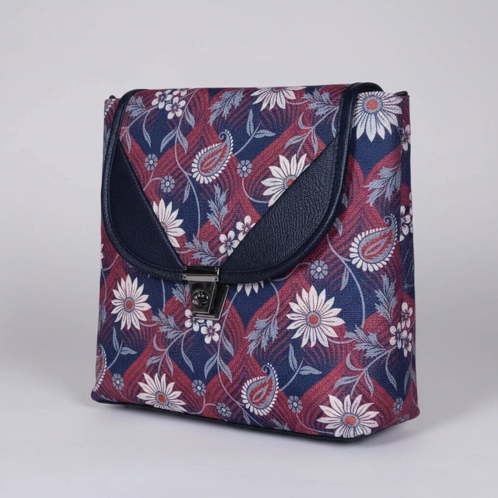Front view of a 10x10 inch multi floral print sling bag with button closure