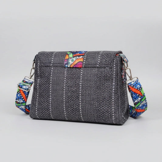 Side profile showing the depth and 10x8 inch dimensions of the floral finesse bag