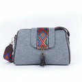 Women's textured jacquard and vegan leather sling bag with printed flap