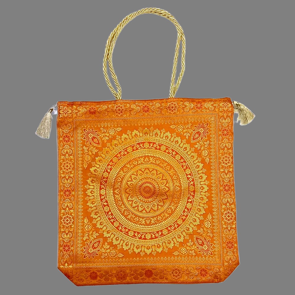 A traditional Banarasi silk handbag with fine quality zari work, a beautiful accessory.