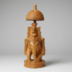 Close-up of the hand-carved details and spherical body of a premium wooden elephant.