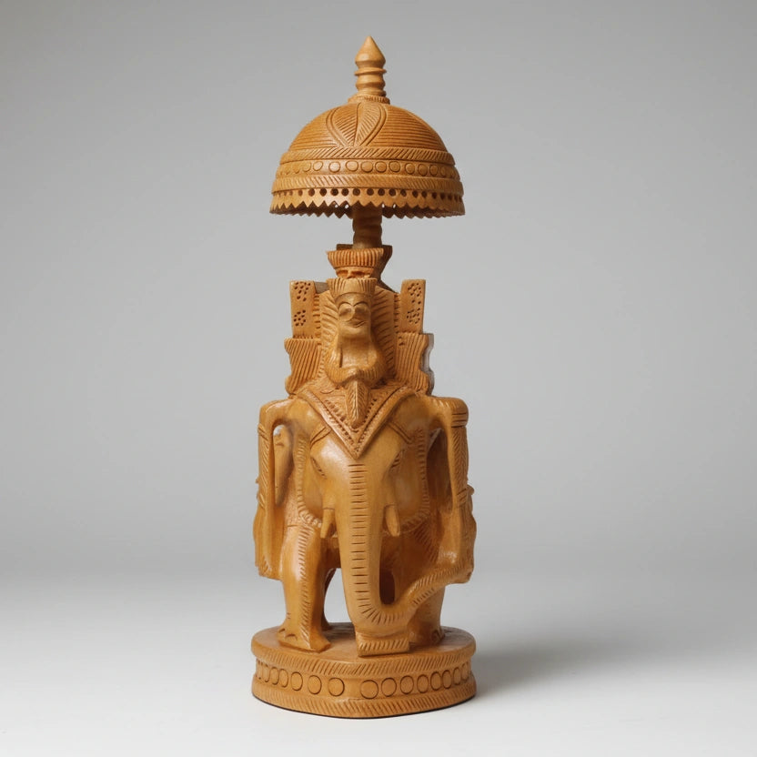 Close-up of the hand-carved details and spherical body of a premium wooden elephant.