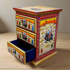 Traditional Rajasthani wooden chest of drawers with marriage procession painting