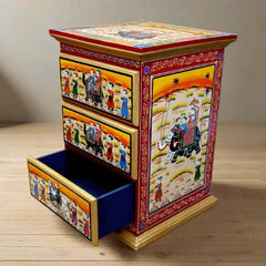 Traditional Rajasthani wooden chest of drawers with marriage procession painting