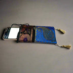 Designer silk mobile holder with compartments for essentials, travel-friendly pouch
