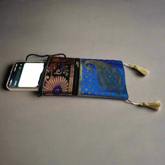 Designer silk mobile holder with compartments for essentials, travel-friendly pouch