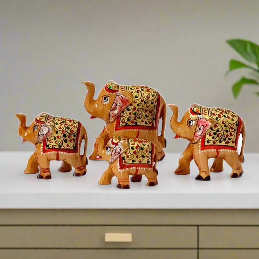 A set of lucky elephant statues with trunks up, ideal for both decor and gifting.