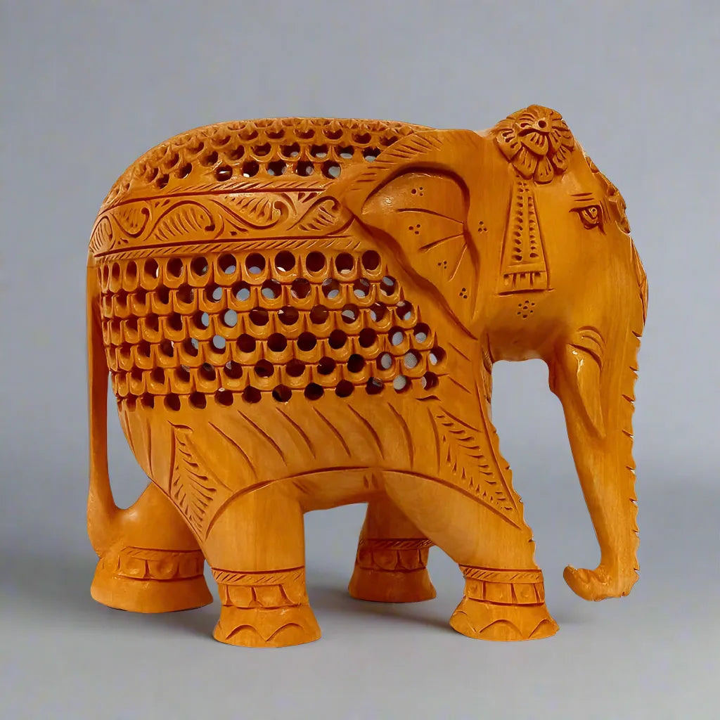 Wooden undercut elephant statue perfect for home and office decoration.