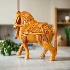 A unique carved wooden horse, an amazing piece of tabletop decor.