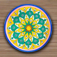 A unique handcrafted wooden plate that serves as an artistic wall accent.