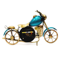 A unique motorcycle-shaped clock, a nice antique gift item for a housewarming or anniversary.