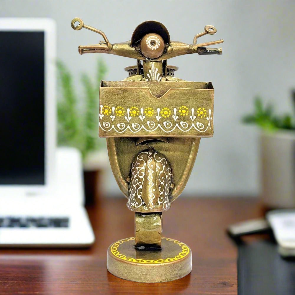 A very different and beautiful scooter-shaped pen stand, great for table decor.