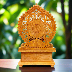 Auspicious wooden sitting Ganpati murti for worship and decoration.