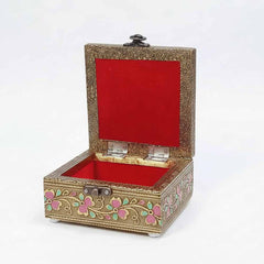 Soft velvet lined interior of peacock design box protecting jewelry or dry fruits securely.
