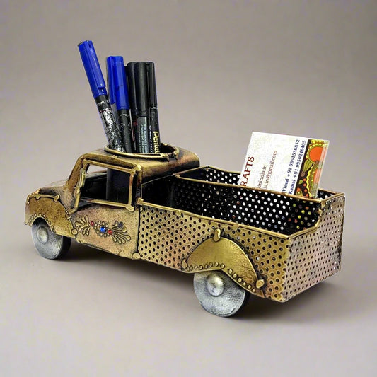 A vintage car model pen holder that enhances the beauty of your office desk.