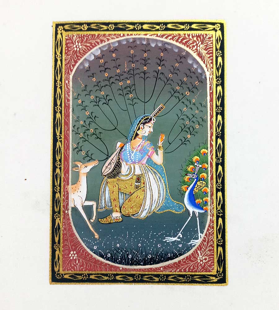 A traditional hand-painted Indian lady painting with vivid colors, a true work of art for your wall.