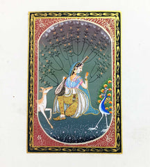 A traditional hand-painted Indian lady painting with vivid colors, a true work of art for your wall.