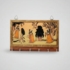 Traditional wooden key holder hanging on a wall, organizing keys with beautiful lady portrait artwork.