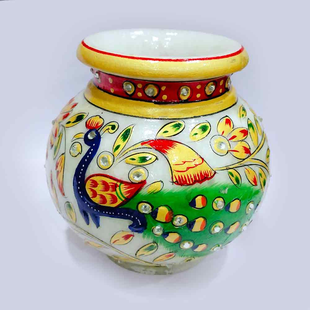 A white marble kalash pot, traditionally used for storing Gangajal holy water.