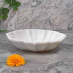 White marble urli bowl for pooja and spiritual rituals