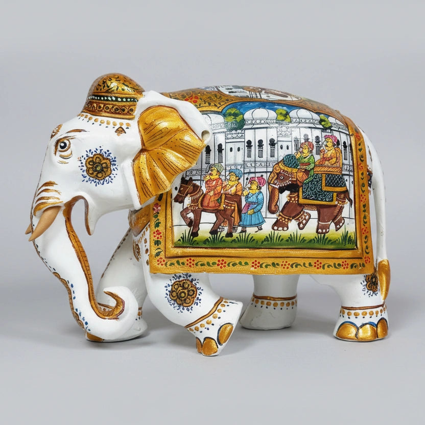 Premium 23x16cm white wooden elephant with handcrafted Mughal painting and gold highlights.