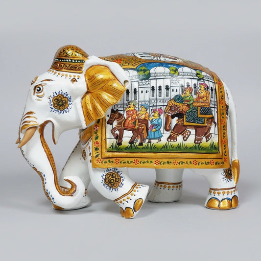 Premium 23x16cm white wooden elephant with handcrafted Mughal painting and gold highlights.