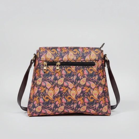 Rear view of the floral bag showing the slim profile and the secure zipper pocket designed for a woman's smartphone.