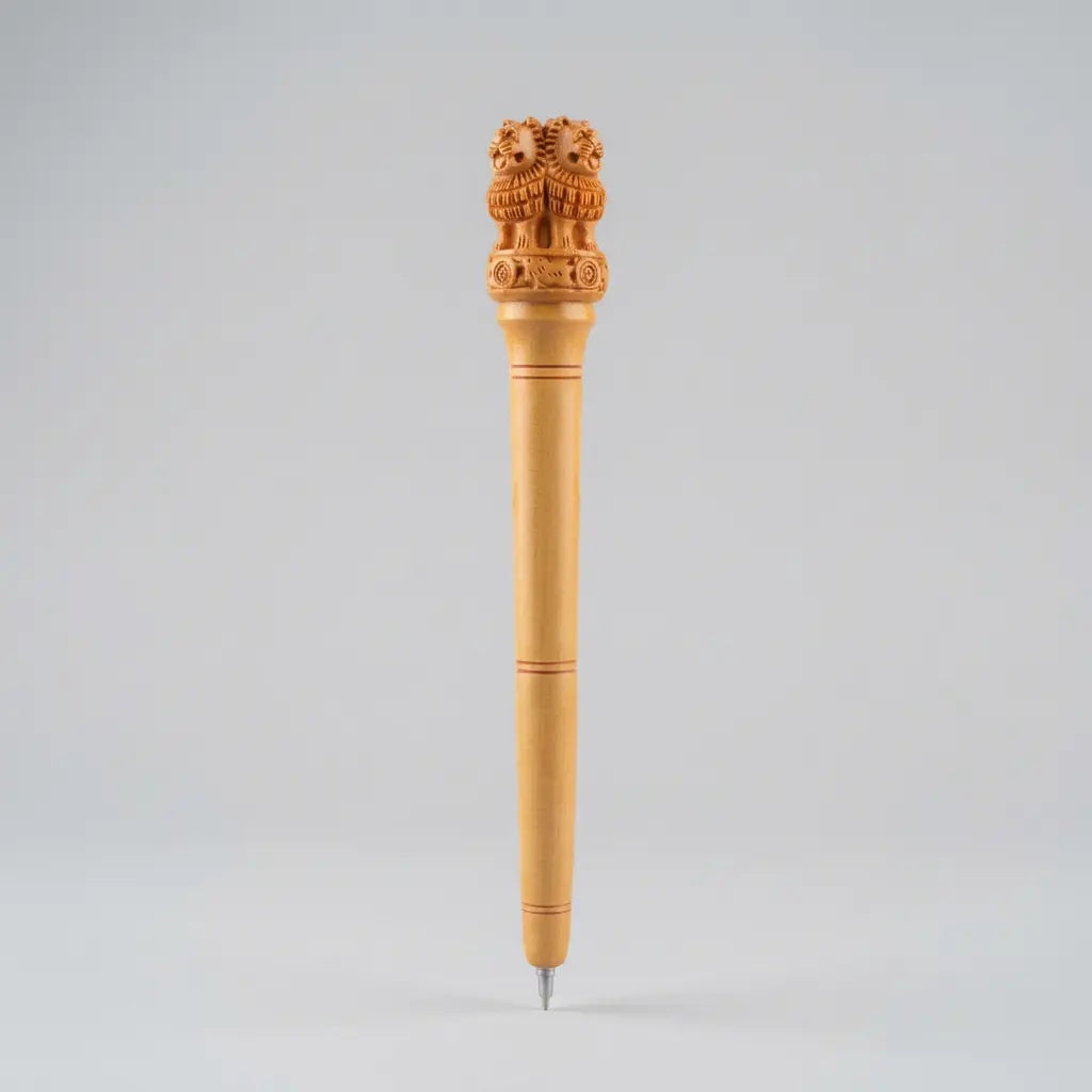 Wooden pen with a carved Ashoka Lion Capital top and fine ring details, front view