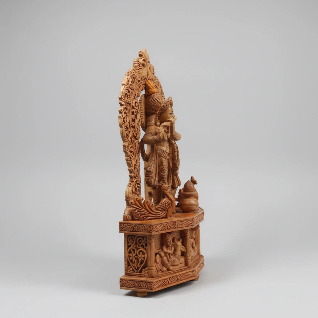 Wood carving Krishna idol with kalash and peacocks — traditional Rajasthani handicraft