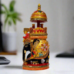 Wooden Ambabari Elephant in black and golden with embossed floral painting.