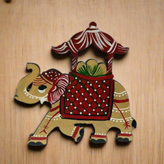 Playful hand-painted elephant magnet for kitchen décor