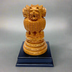 Detailed wood-carved Ashok Stambh decorative piece