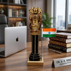 Front view of wooden Ashoka Pillar with dark brown column, golden detailing and Indian flag on a square base