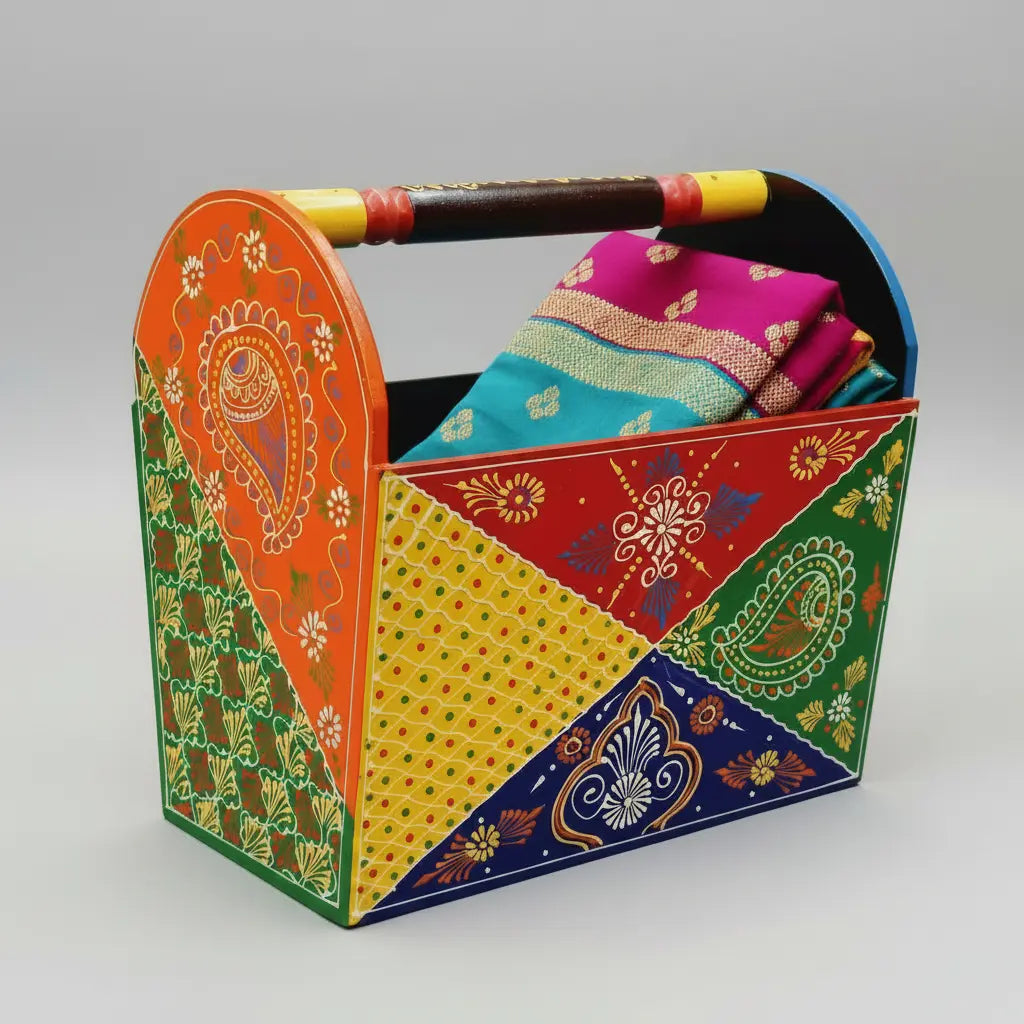 Close-up of hand painted Rajasthani folk art design on wooden basket