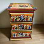 Wooden chest of drawers with hand-painted royal marriage procession design
